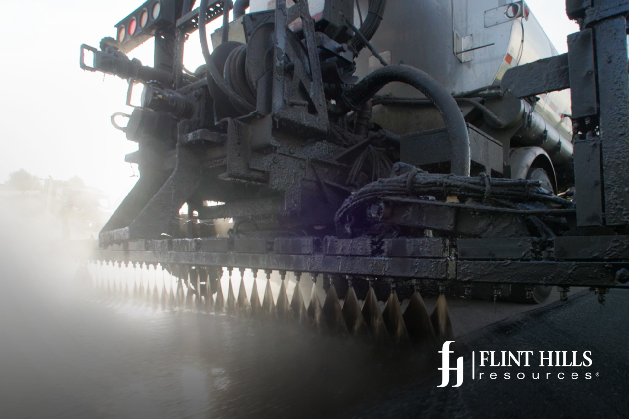 Flint Hills Resources asphalt paver spraying asphalt