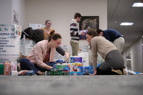 Employees pack gifts