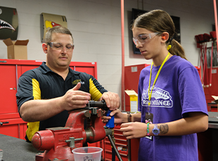 Image of a student and teacher